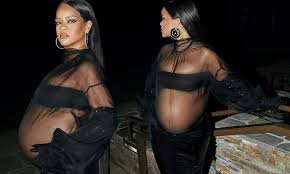 Rihanna cradles her burgeoning baby bump as she looks back at her revealing  sheer Oscars party gown | Daily Mail Online