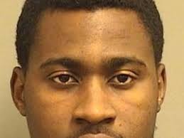 Police say gang member living in former county commissioner's home faces  charges for two shootings