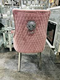 A simply stunning premium quality chair that will work well as an individual dressing table accent or as a set for dining. Avery Luxury Quilted Pink Velvet Chrome Leg Lion Knocker Dining Chair