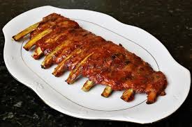 Cover the pork riblets and pan with aluminum foil and place your riblets in the preheated oven. Baked Pork Ribs With Barbecue Or Bbq Sauce Stock Photo Image Of Recipe Sauce 129695316