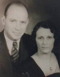 My grandparents, Charles and Evelyn (Wilson) Hooker, standing beside the  Plumer mansion. In the 1920 census, they were living at 414 Franklin  Street, which I believe is next to, or near, that