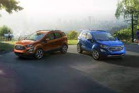 2018 Ford Ecosport Ses In Canyon Ridge And Titanium In Lightning Blue Parked Overlooking Cityscape Ford Ecosport Ford Bike News