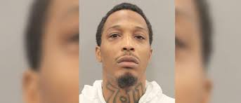 Suspect charged in fatal shooting of woman in Houston