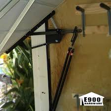 You'll feel secure and confident with this barn door kit that looks attractive and will hold a door that weighs up to 200 pounds. E900 Hardware E900 Universal One Piece Garage Door Hardware Kit E900 R The Home Depot
