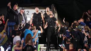 Photos The Hounds Of Justice Promise To Take On The World At Wwe Tlc Wwe Roman Reigns Wwe Raw Results