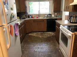 Water Line Broke On The Refrigerator Water Damage To The Kitchen Floor And Cabinets Kitchen Flooring Kitchen Kitchen Cabinets