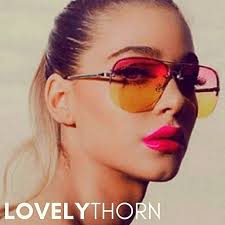 QUAY // ltd ed muse pink yellow fade rimless aviator sunglasses rare