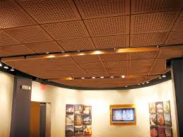 The ceiling grid hanging freely in space. Wooden Suspended Ceiling Kaya Panel Suspended Ceiling Panel Decorative Perforated