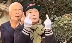 Beijing's wolf warrior diplomacy was seen as more offensive after zhang heqing, a ccp diplomat in pakistan, tweeted an image of a middle finger, which attracted global attention. Pensioners The Park Appear To Be Making A Very Rude Gesture But It Turns Out They Are Meditating Daily Mail Online