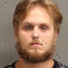 22-year-old Michael Lening is charged with the #AggravatedAssault of his  friend, who was learning to drive a stick shift. An arrest warrant alleges  that Michael Lening was riding with his friend, Tyler