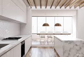 Find the perfect home furnishings at hayneedle, where you can buy online while you explore our room designs and curated looks for tips, ideas & inspiration to help you along the way. Side View Of A White Wooden Kitchen With A White Marble Bar Stock Photo Picture And Royalty Free Image Image 91305669