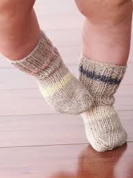 Then knit ribbing (knit 2 purl 2) until sock is 7 (1/3 months), 8 (6/9 months) or 9 (12/18 months) cm long. Stretch Baby Socks Baby Socks Knit Baby Socks Pattern Baby Knitting Patterns