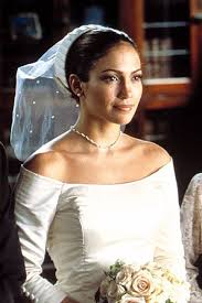 These Are 40 Of The Most Iconic Movie Outfits Ever Movie Wedding Dresses Wedding Movies Wedding Planner Movie