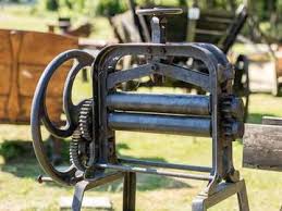 What S The Difference Between Wringer And Ringer What Does Through The Wringer Mean Merriam Webster