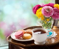 A beautiful cup of coffee is always brighten mood in morning, if you are a serious coffee drinker then you would know what it means to live a day without coffee. Cup Of Coffee With Macaroons On A Table With Flowers Ranunculus Stock Photo Picture And Royalty Free Image Image 20457738