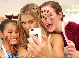 Delta Goodrem takes Voice Kids Australia contestants to cupcake cooking  class