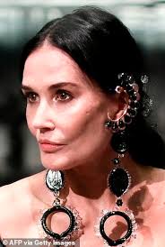 After seeing demi moore walk down the runway, fans of the actress are asking: Demi Moore S Face Appears Back To Normal In New Fendi Show Image After Sparking Plastic Surgery Daily Mail Online