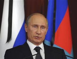 Back in Russia flood zone, Putin tries to protect image