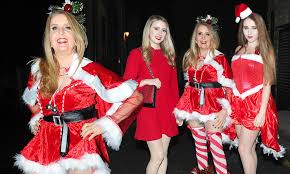 The children's faces were unmoved. Gillian Mckeith 59 Transforms Into A Raunchy Mrs Claus In A Thigh Skimming Dress And Stockings Daily Mail Online