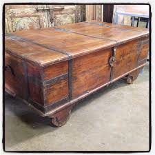 Mug fresh roasted coffee beans looks giant on tiny table. Coffee Table Nadeau Dallas