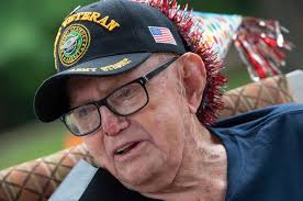 Drive-thru parade celebrates WW II Mississippi veteran's 99th birthday