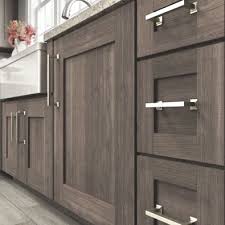 Slide the soft close hinge into the mounting plate, and then push it into the plate to clip it into place. Cabinet Hardware Buying Guide