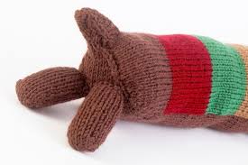 Watch your knitting video now! Stripy Sausage Dog Extract From Knitted Dogs And Puppies By Sue Stratford How To Make A Dachshund Plushie