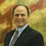 Dr. John L. Couvaras, MD