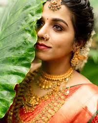 Most weddings are a union of two souls. For @rania_sen_choudhury  and@p.r.n.v.r it was also a stunning celebration of two heritages. From the  vibrant rituals of Bengal to the timeless traditions of Kerala,