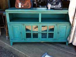 Perfect Accent Piece Cute Design Fyi Tv Stand Apartment Makeover Rustic Painted Furniture Elegantly hides any cables that are attached to displays