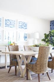 It also typically does better with wear and tear. Wicker Chairs At Light Wood Dual X Base Table Cottage Dining Room