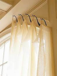 However, due to light control and uv concerns many consider covering these specialty windows. Genius Idea For Odd Shaped Sized Windows Hooks Instead Of A Rod Arched Window Treatments Window Coverings Window Treatments