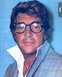 Dean Martin posing for a photo immediately after catching an Elvis Presley  concert in Las Vegas. Circa 1973.