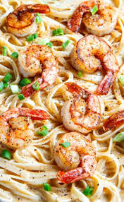 Cajun Shrimp Fettuccine Alfredo Recipe A Creamy Alfredo Fettuccine Spiced With Cajun Seasoning And Served Fettuccine Alfredo Recipes Recipes Seafood Recipes