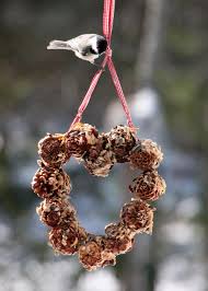If you'd like to attract birds to your yard this winter, here's a fun and festive way to do it. Handmade Pinecone Bird Feeder Hgtv