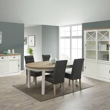 La table à manger peut accueillir jusqu'à 6 personnes. Table De Repas Ovale A Allonge Blanc Bois Dunedin Salle A Manger