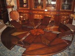 22 Jupe Table With Self Storing Leaves Center Pops Up Round Extendable Dining Table Extendable Dining Table Furniture Design Modern