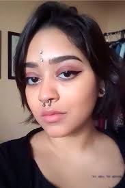 Tips And Tricks To Learn Before Getting A Nose Piercing Nose Piercing Facial Piercings Piercing