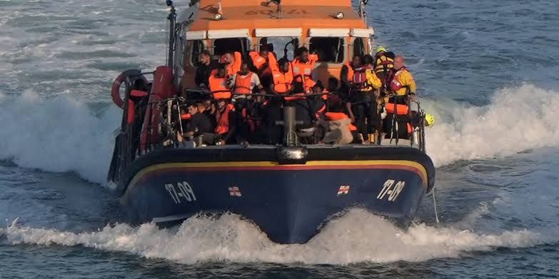 Migrant crisis: RNLI 'taxi service' boats packed with mega dinghy asylum  seekers rejected by two English ports