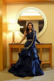 Gorgeous Dark Blue Ruffle Dress With Tassels For Cocktail Party See More On Wedmegood Com Wedmeg Indian Wedding Gowns Blue Ruffle Dress Indian Gowns Dresses