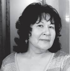 A.I.M. leaders question Anna Mae at Wounded Knee Legal Defense Office in  1975