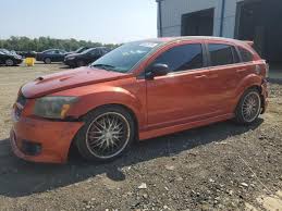 Image result for Sunburst Orange 2009 Caliber