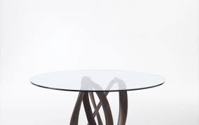 This elegant, contemporary table combines a beautifully carved infinity base in solid canaletta walnut or frassino ash with a top in 10mm tempered glass. Infinity Official Dealer Of The Porada Factory In Russia