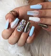 Light blue and silver glitter nail. 43 Stunning Ways To Wear Baby Blue Nails Stayglam