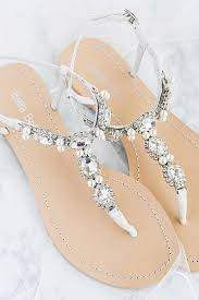 24 Beach Wedding Shoes Perfect For An Seaside Ceremony Wedding Dresses Guide Beach Wedding Shoes Wedding Shoes Sandals Wedding Shoes