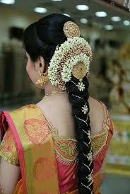 15 Popular South Indian Bridal Hairstyles For Engagement In 2020 Bridal Hairstyle Indian Wedding South Indian Wedding Hairstyles Bridal Hair Decorations