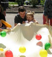 The Final Activity Was A Parachute And Balloon Activity This Is Another Playgroup Activity Toddler Party Games Toddler Birthday Party Hungry Caterpillar Party