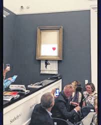 Anonymous artist banksy put a video on his instagram showing how he secretly built a shredder into the frames of one of his most famous pieces of art, in case it was ever sold at auction. Banksy Painting Shredding