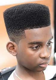 For a neutral, natural look, a clean cut paired with a low fade is the right way to go. 20 Eye Catching Haircuts For Black Boys