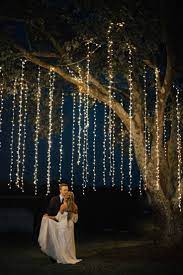 A Rustic Fairytale Wedding In Georgia A Princess Inspired Blog Dancing Under M Hanging Lights Wedding Reception Hanging Lights Wedding Forest Theme Wedding